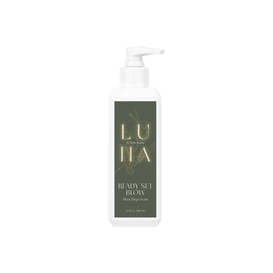 Luna hair care product in a pump bottle, labeled "Ready Set Blow, Blow Dry Cream.