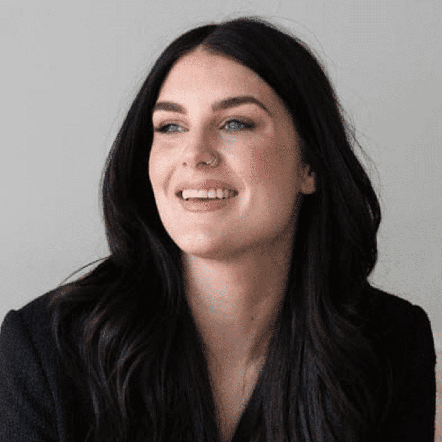 Portrait of Mallory, a professional stylist at Stella Beauty, showcasing their expertise and style.