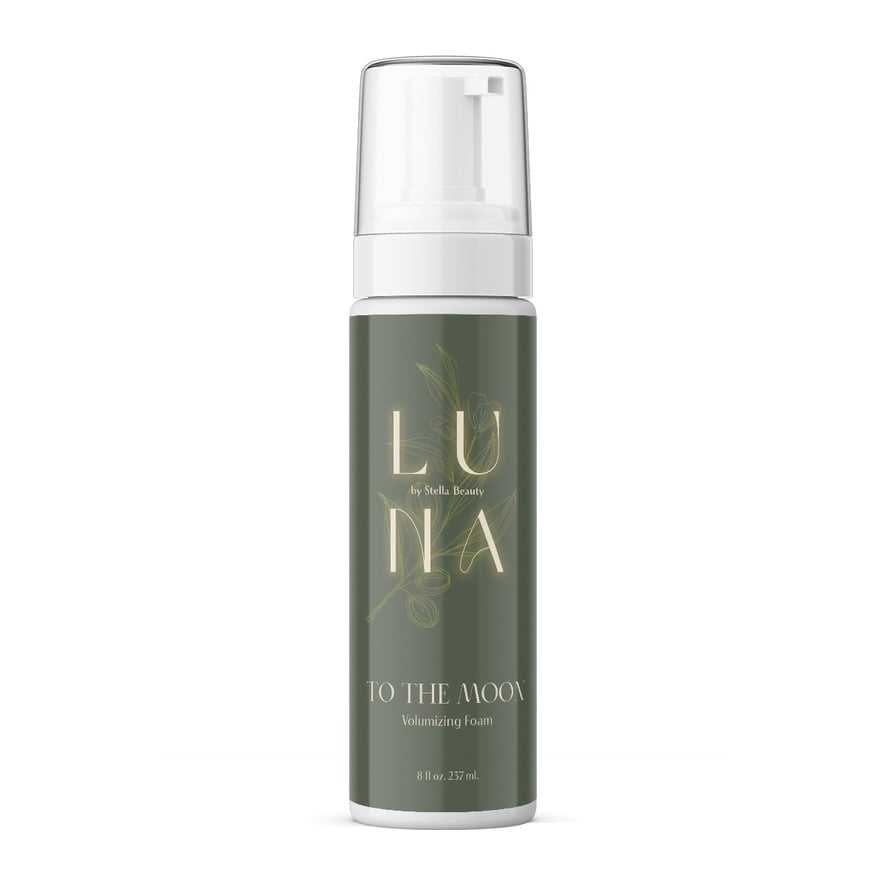 Volumizing foam bottle labeled "Luna" with botanical design and 8 fl oz size.